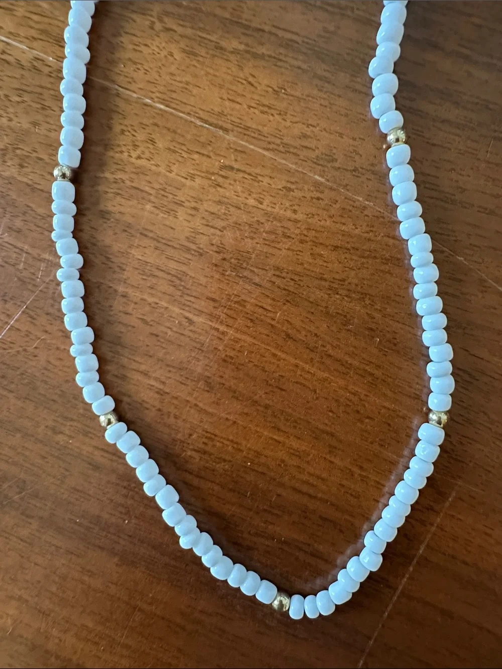 White Beaded Necklace with Gold Accent Beads‎